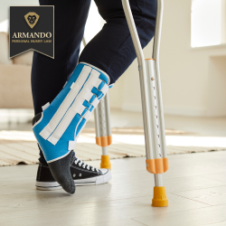 An injury victim in Largo walking on crutches with their foot in a medical boot