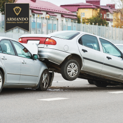 Two silver cars involved in rear-end collision in Pinellas Park, with one vehicle lifted onto the other vehicle's hood