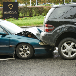 Green sedan rear-ends a black SUV on the road in Tarpon Springs, showing significant front-end damage