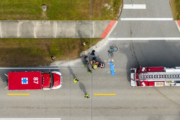 Emergency responders assisting a cyclist after a crash in South Tampa.
