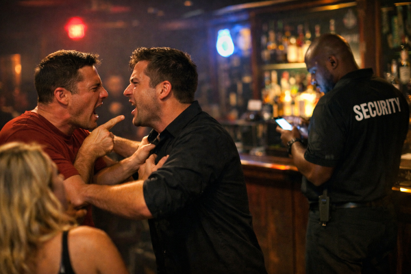 Security guard distracted while a confrontation escalates inside a Tampa business.