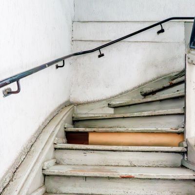 Unsafe stairwell handrail in apartment complex