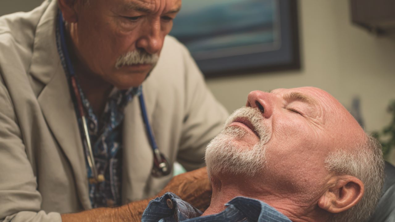 Doctor examining patient for concussion symptoms