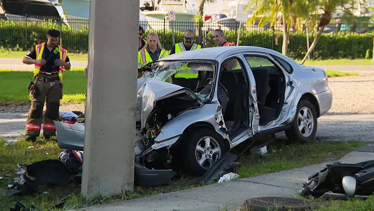 Damaged vehicle after a Florida car accident involving an injured passenger