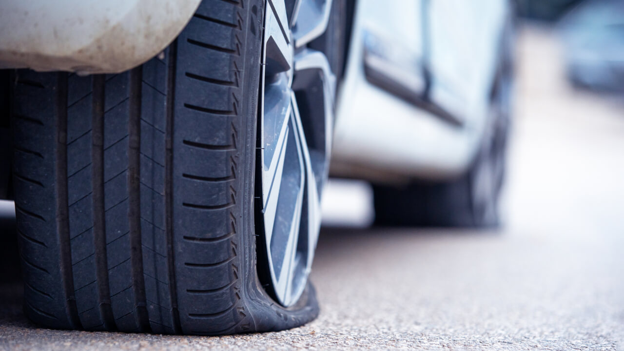 Rental car accident evidence showing tread depth failure and maintenance issues relevant to Graves Amendment disputes